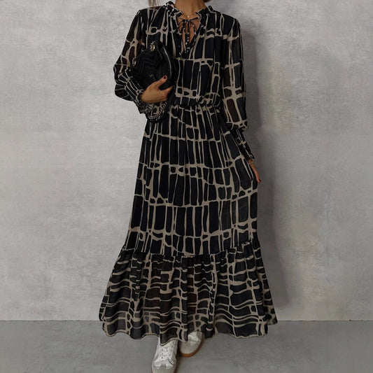 Woman wearing Women's Striped Flared Maxi Dress in an autumn setting