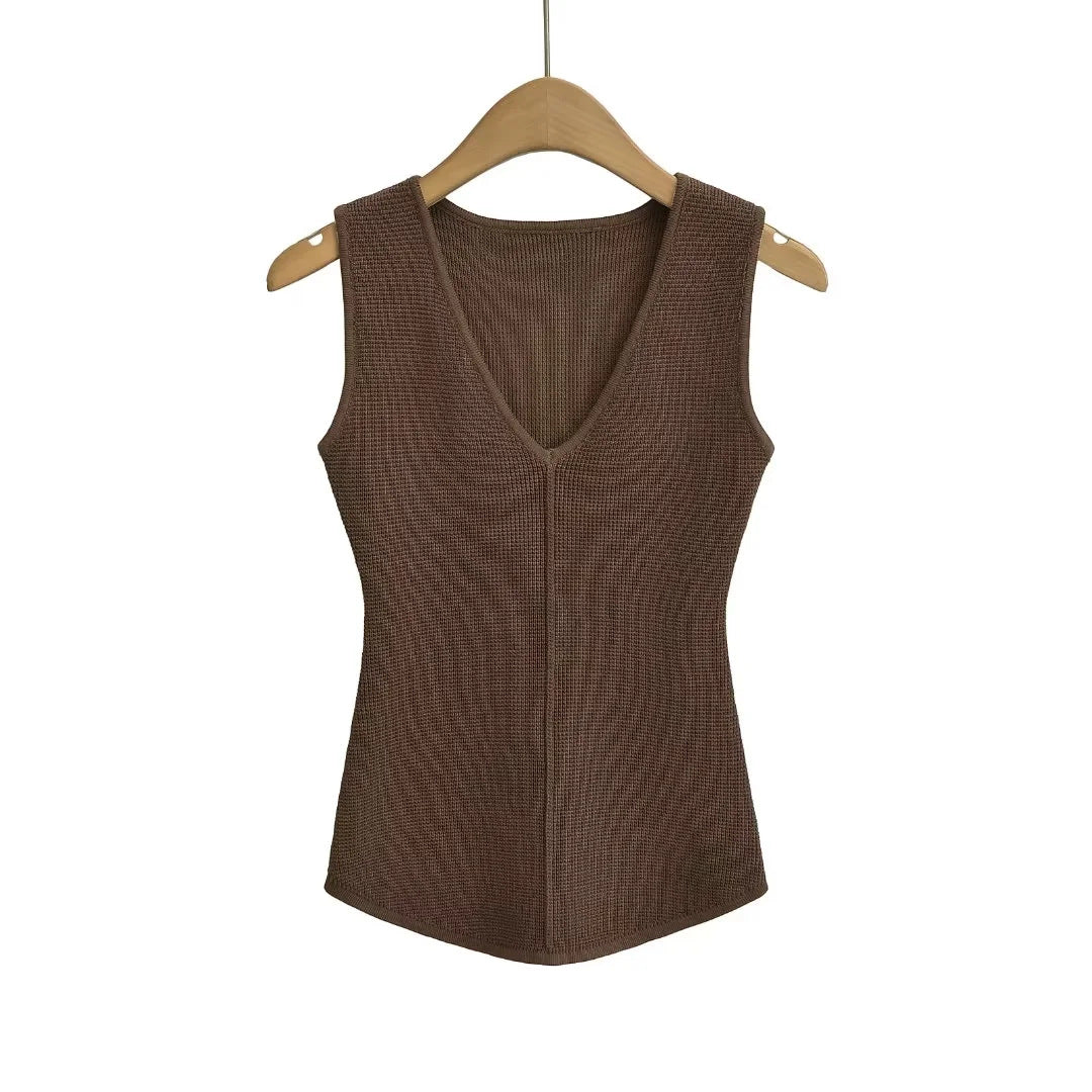 Woman wearing sleeveless vest for women in a casual outdoor setting