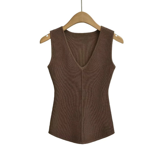 Woman wearing sleeveless vest for women in a casual outdoor setting