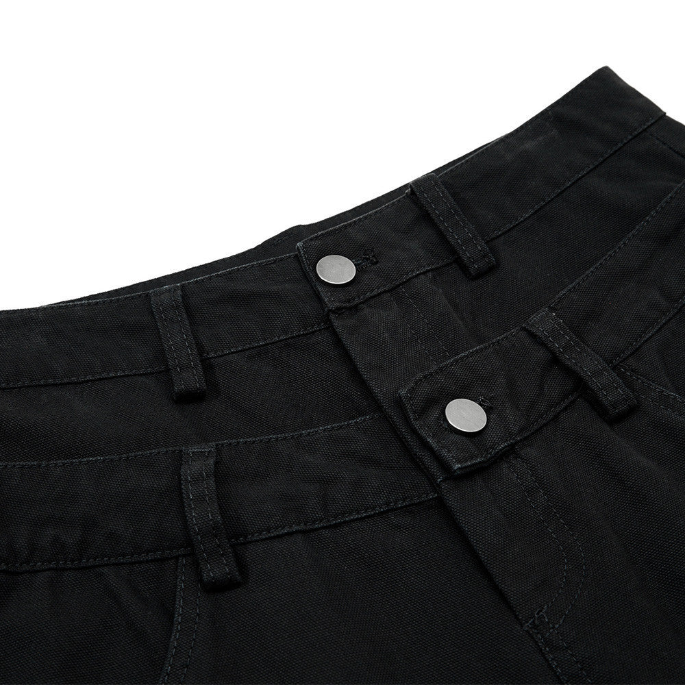 Woman wearing Fake Two Piece Spliced Denim Wide Leg Pants in a stylish urban setting