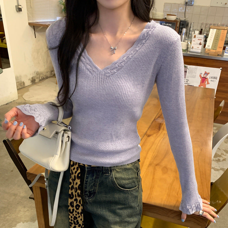 Woman wearing Slim Fit V-Neck Knit Top in a casual setting