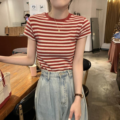 Woman wearing Striped Slim Fit T-Shirt in a casual setting