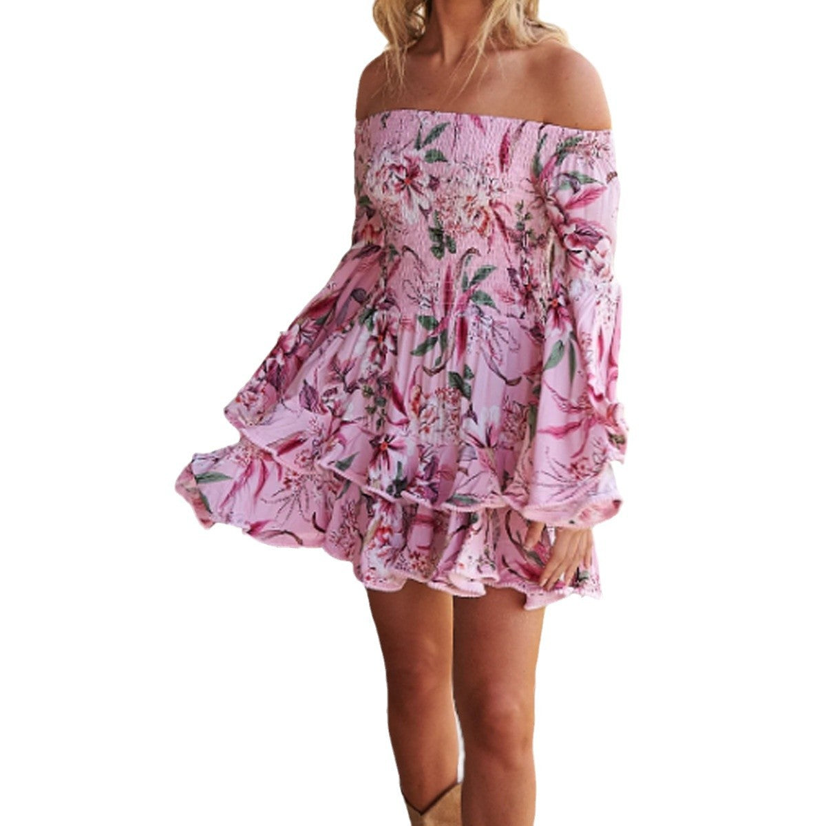 Woman wearing One-Shoulder Floral Print Ruffle Dress in a sunny garden