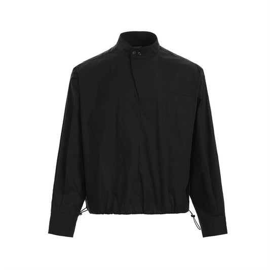 Woman wearing Stand Collar Half-Zip Casual Shirt in a modern urban setting