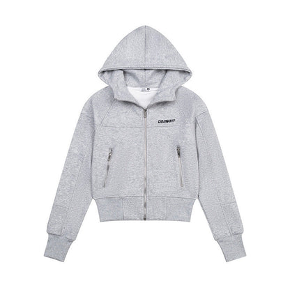 Woman wearing Hooded Sweatshirt with Zipper Pocket in a city setting