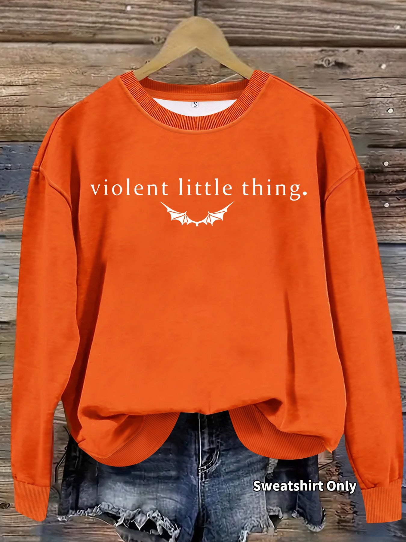 Woman wearing Round Neck Pullover Hoodie in a casual setting