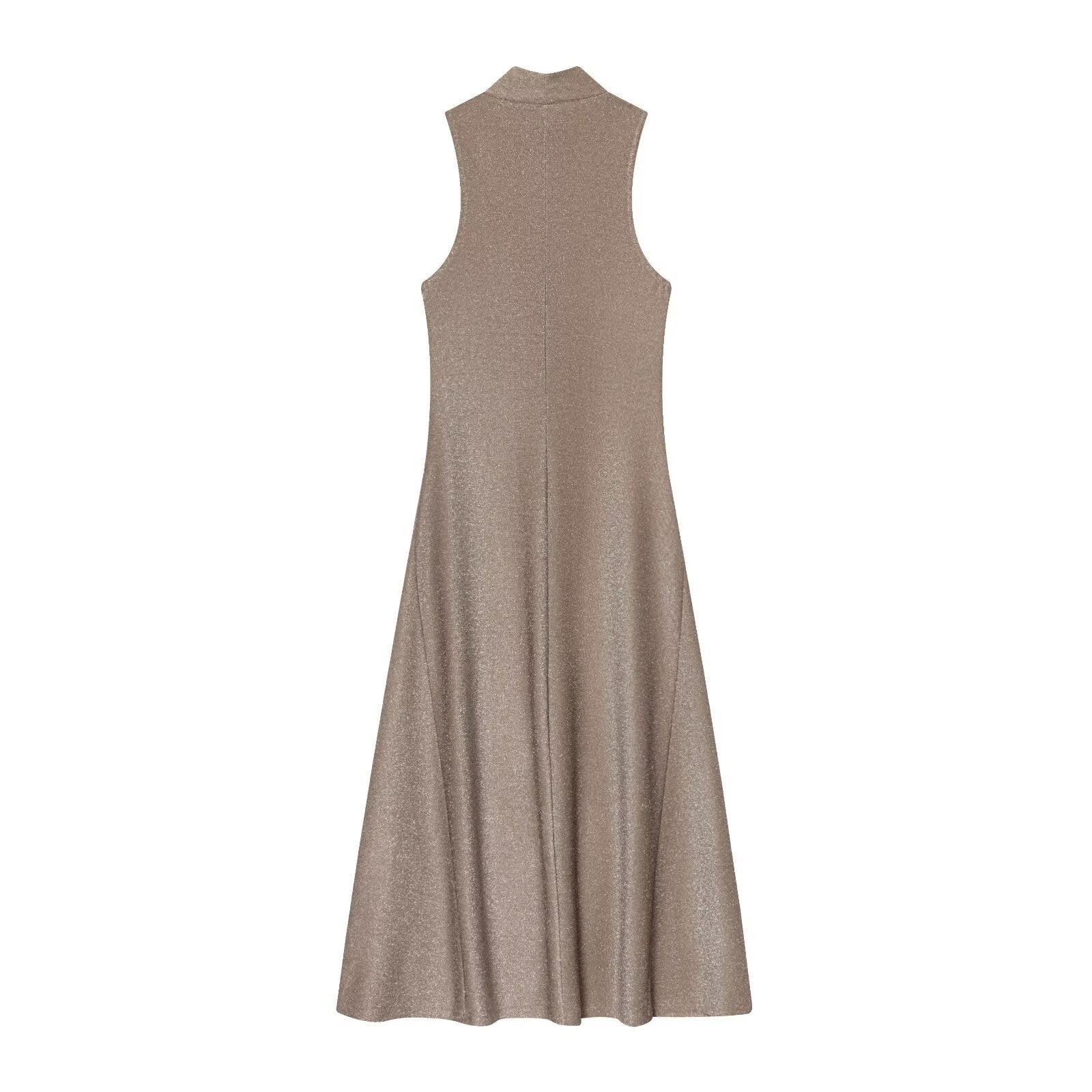 Woman wearing metallic sleeveless dress in a casual setting