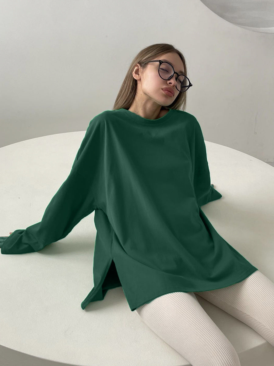 Woman wearing Loose Fit Long Sleeve Slit T-Shirt in a casual setting