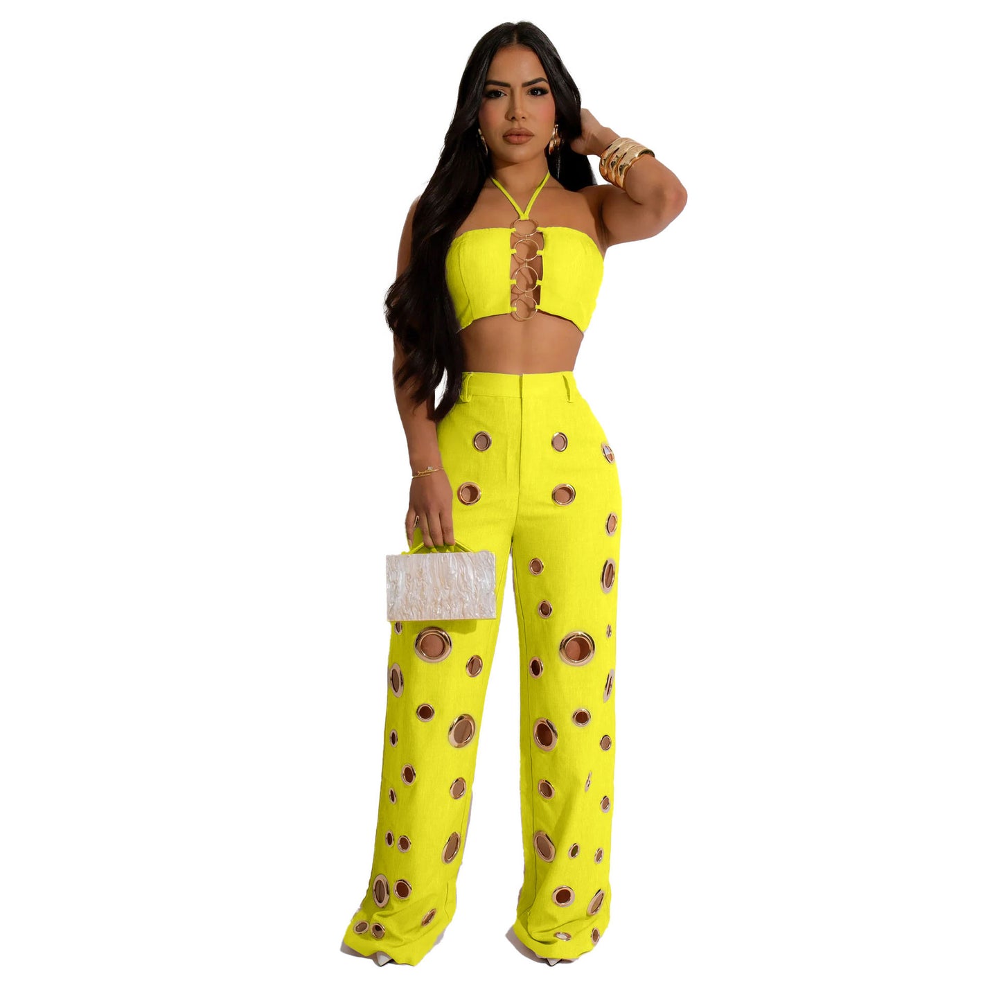 Woman wearing Flattering Ripped Fitted Two-Piece Nightclub Outfit in a vibrant nightclub setting