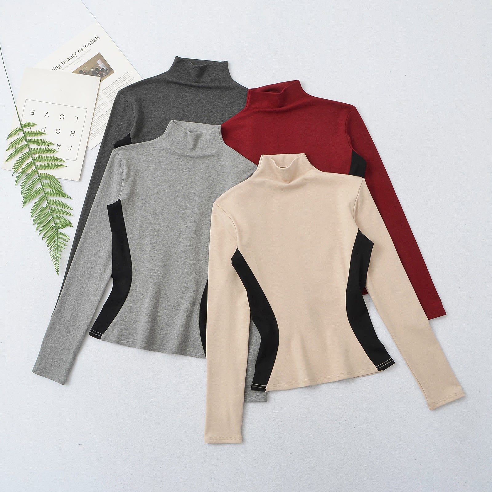 Woman wearing Color Block High-Neck Slim Fit Long Sleeve Top in a casual setting
