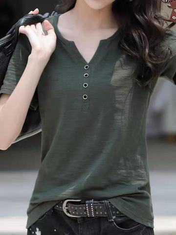 Woman wearing Loose Plus Size V-Neck Short Sleeve Casual T-Shirt in a casual setting
