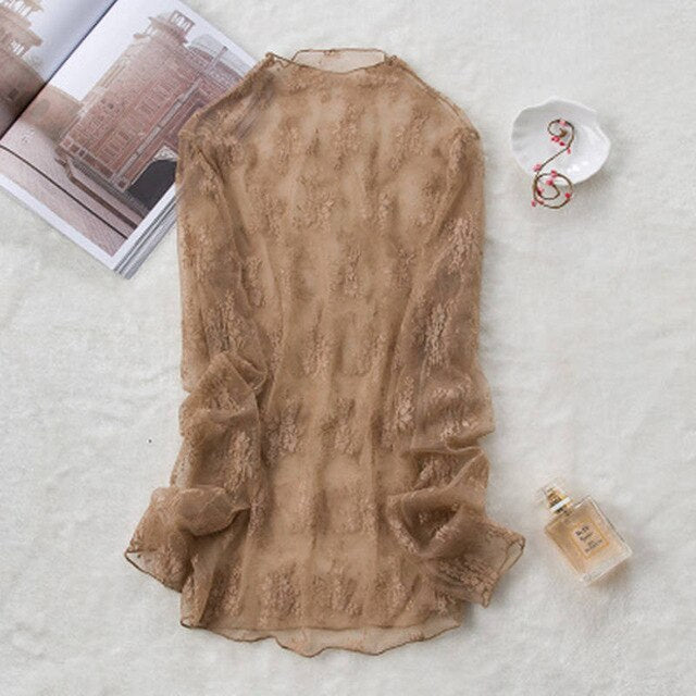 Woman wearing Transparent Korean Lace Blouse in a casual outdoor setting