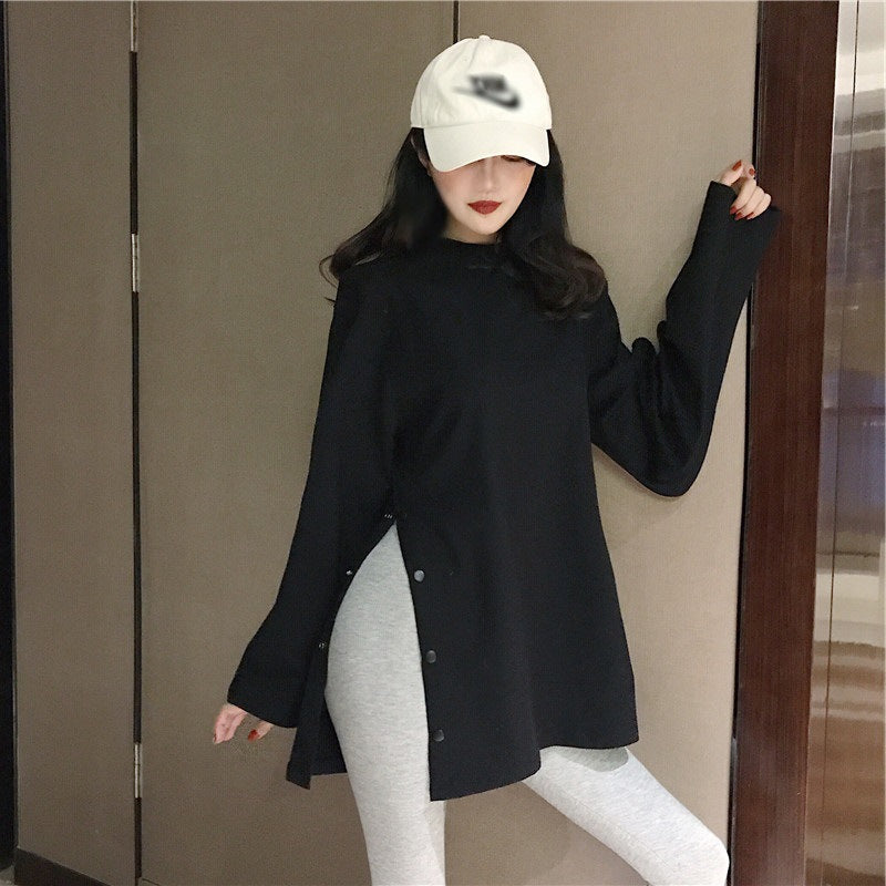Woman wearing Plus Size Long Sleeve Midi Top in a casual setting