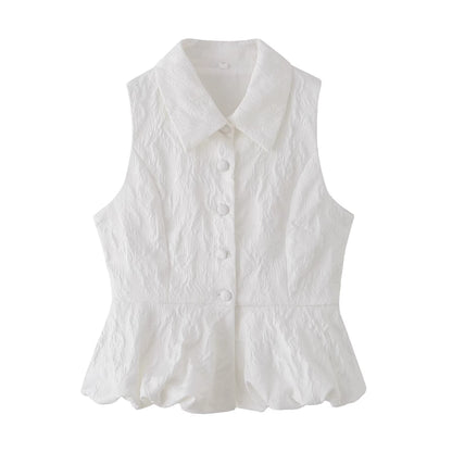 Woman wearing Jacquard Polyester Sleeveless V Neck Top in a sunny outdoor setting