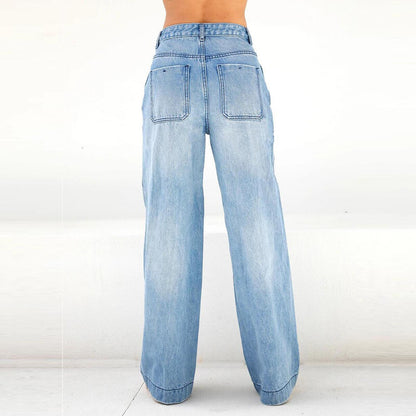 Woman wearing loose denim pants in a casual outdoor setting