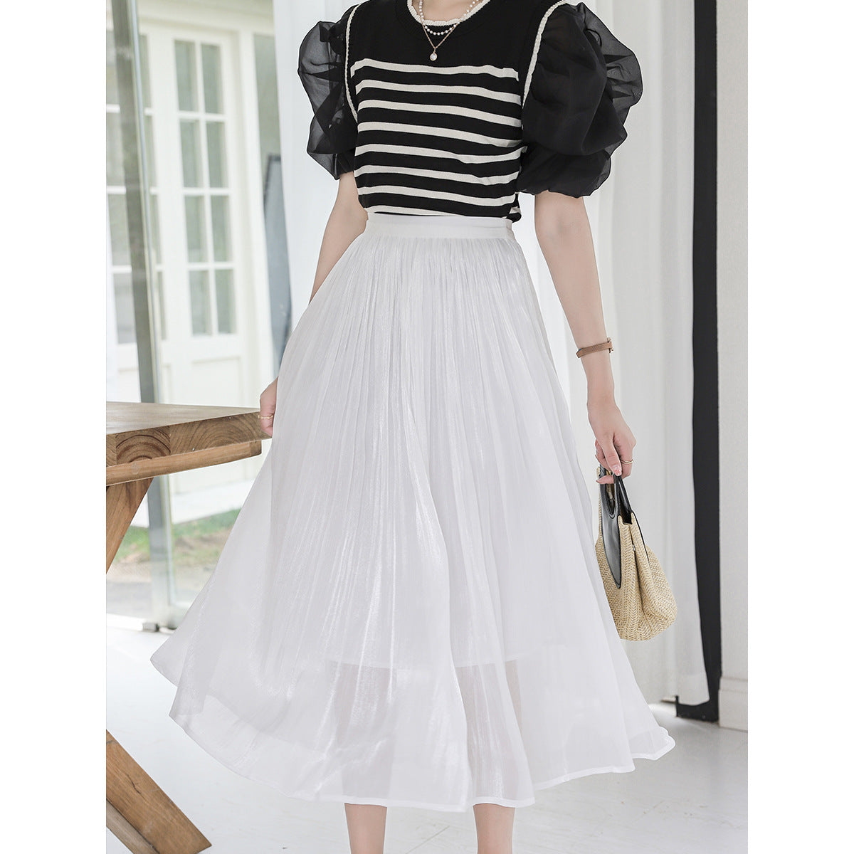 Woman wearing A-Line Skirt in a stylish urban setting