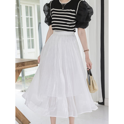Woman wearing A-Line Skirt in a stylish urban setting