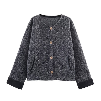 Woman wearing Flower Yarn Cocoon Sweater Jacket in a cozy setting