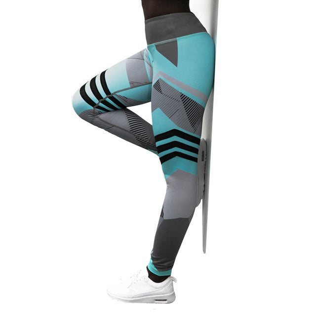 Woman wearing Yoga Pants in a yoga studio