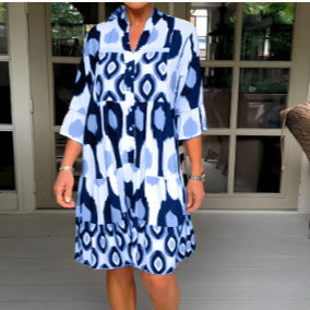 Woman wearing Fresh Print A-Line Patchwork Dress in a sunny outdoor setting