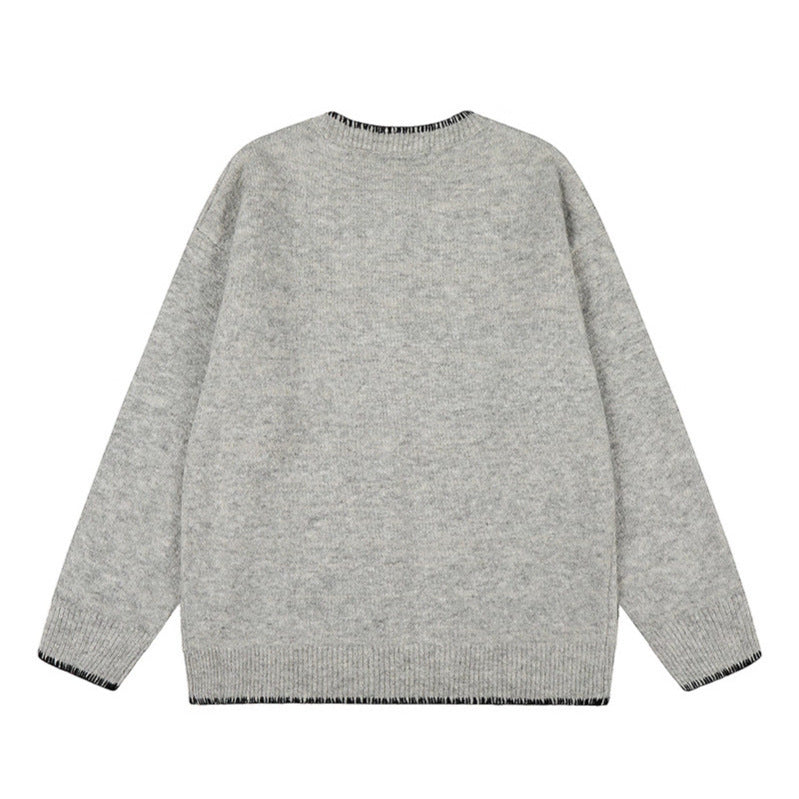Woman wearing Hand-Stitched Loose Fit Knit Cardigan in a cozy setting