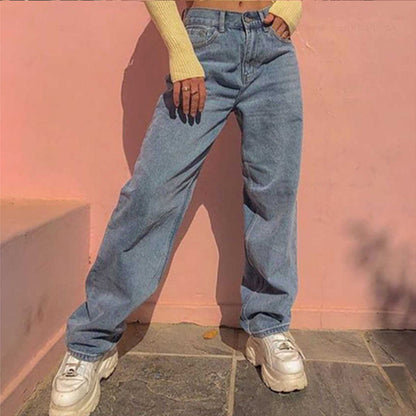 Woman wearing wide leg jeans in a casual outdoor setting