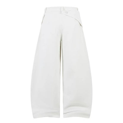 Woman wearing Loose Wide Leg Drop-Crotch Pants in urban setting