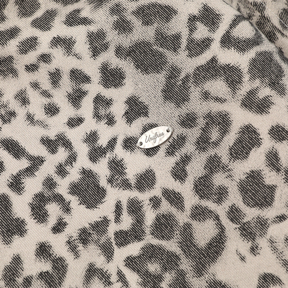 Woman wearing Leopard Print Hooded Cotton Jacket in an urban setting