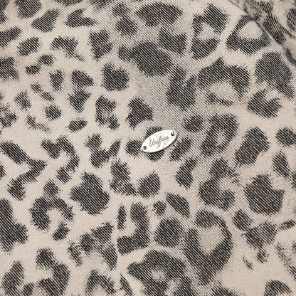 Woman wearing Leopard Print Hooded Cotton Jacket in an urban setting