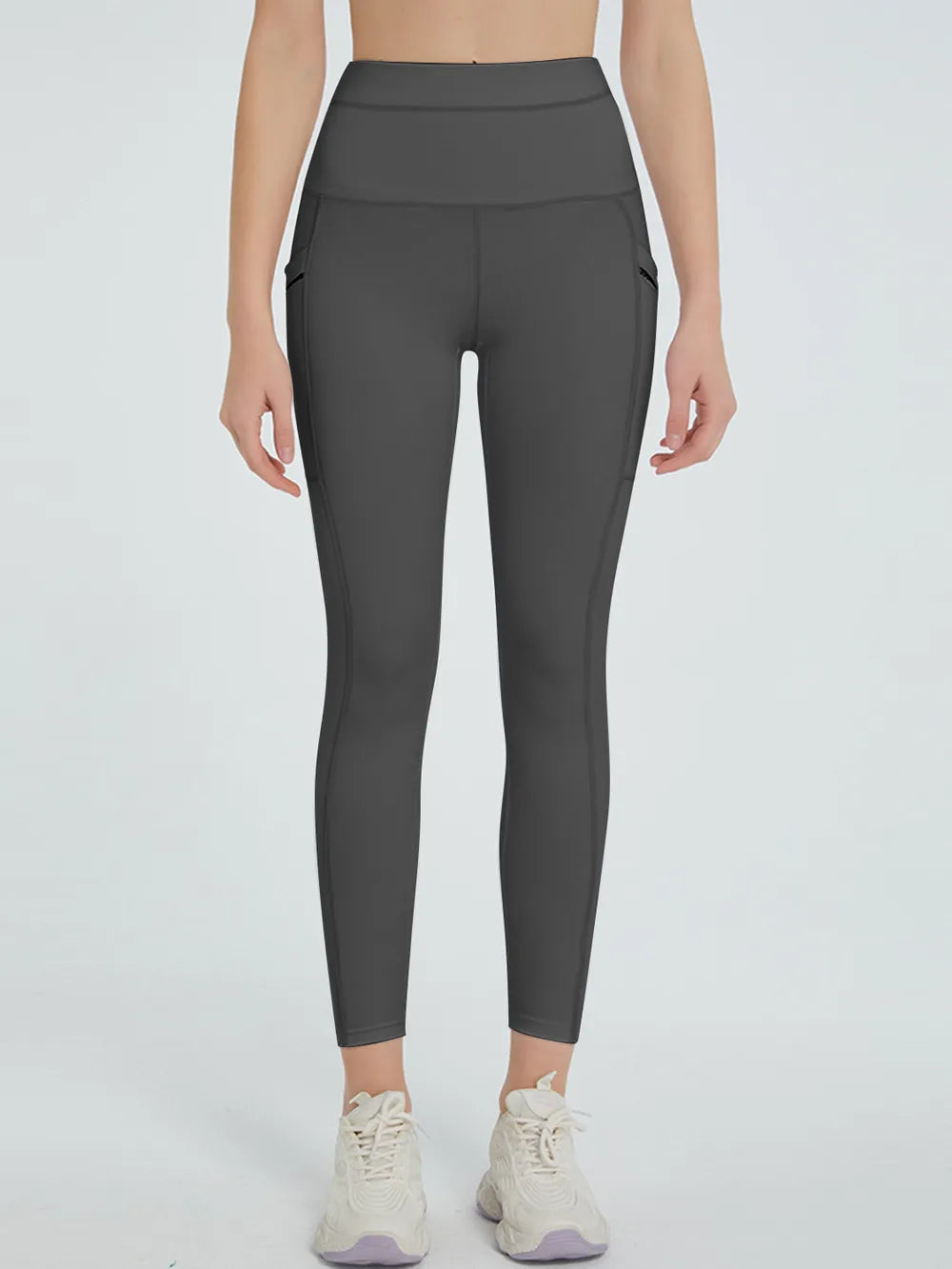 Woman wearing High Waist Active Leggings in a fitness setting