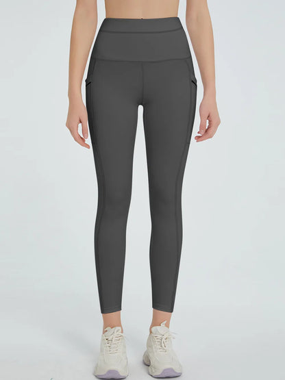 Woman wearing High Waist Active Leggings in a fitness setting
