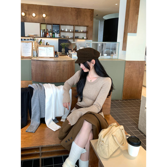 Woman wearing Slim Fit Wool Blend Knit Sweater in a cozy indoor setting