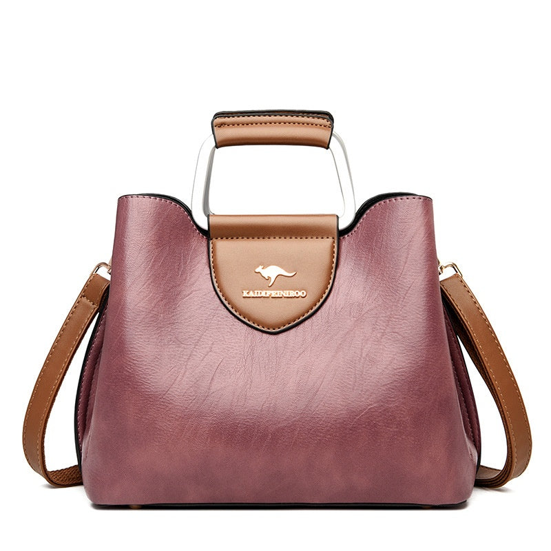 Women's PU Leather Zipper Buckle Crossbody Shoulder Bucket Handbag – Model View | TajStylo