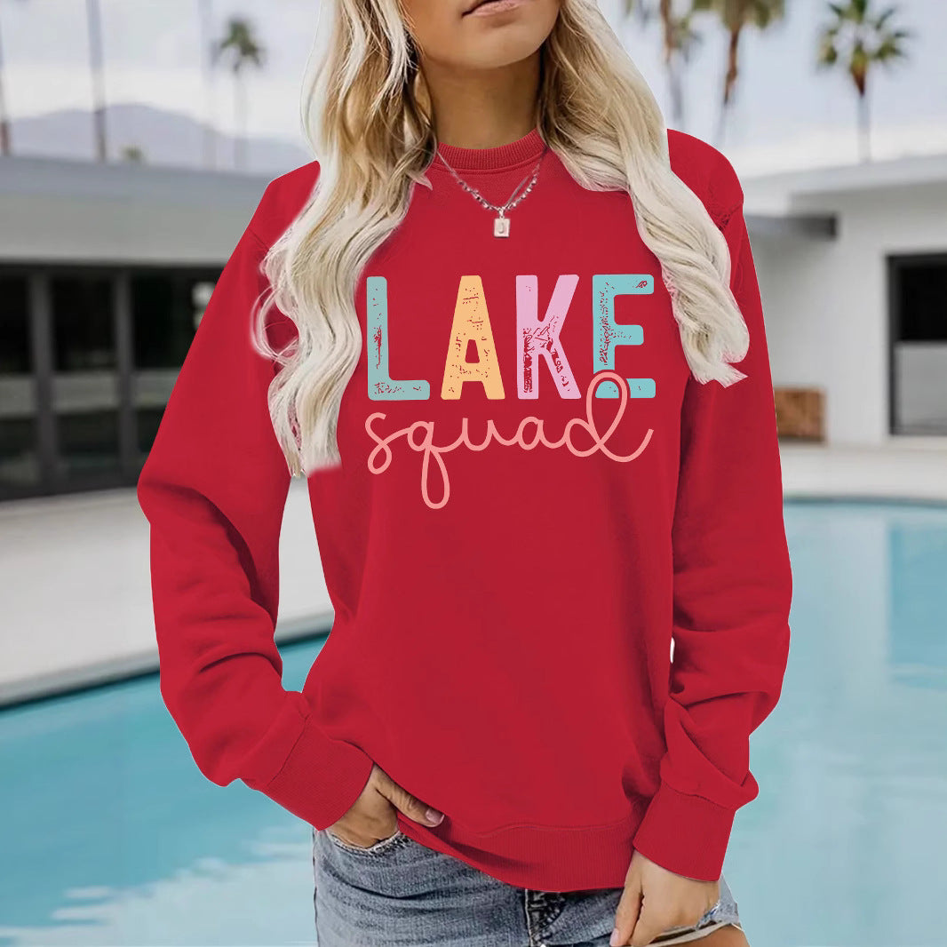 Woman wearing LAKE Printed Hoodie in a casual outdoor setting