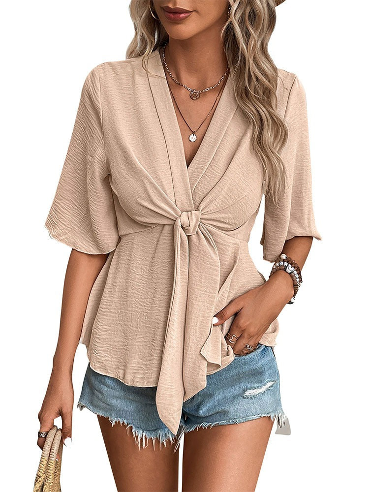 Woman wearing V Neck Solid Color Shirt for Women in a summer setting