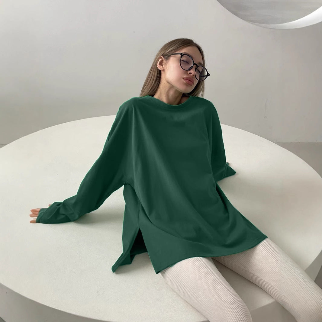 Woman wearing Loose Fit Long Sleeve Slit T-Shirt in a casual setting