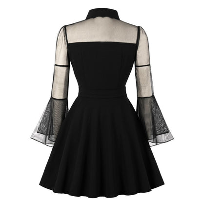 Woman wearing Gothic Mesh Patchwork Flare Sleeve Dress in a party setting