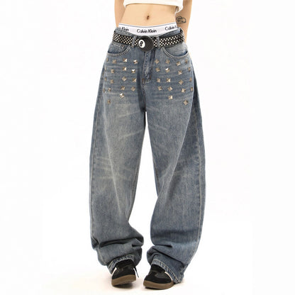Woman wearing Edgy Square Stud Denim Pants in a street setting