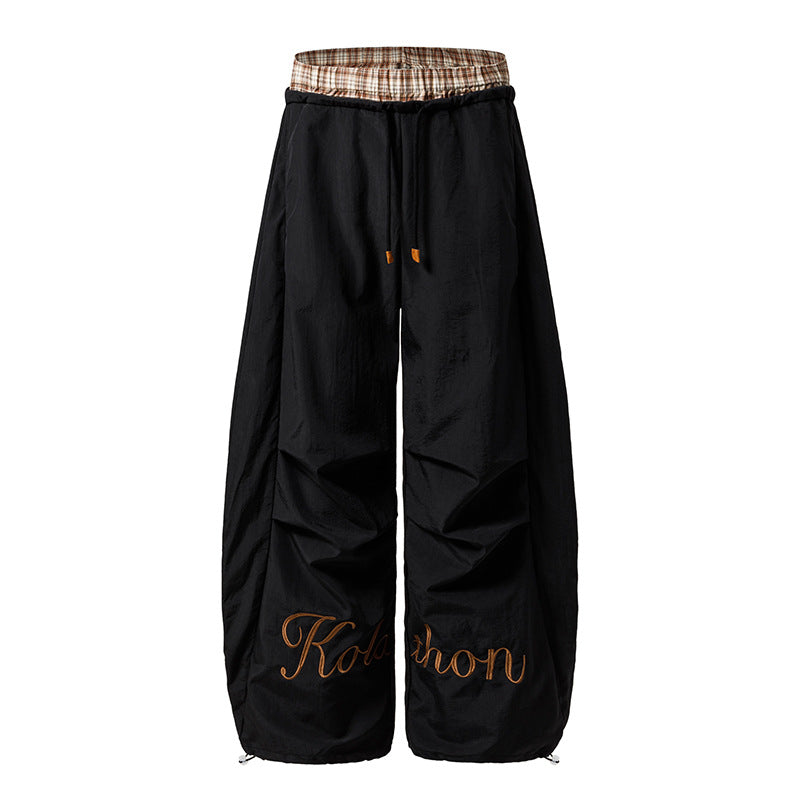 Woman wearing Plaid Patchwork Wide Leg Pants in a casual setting