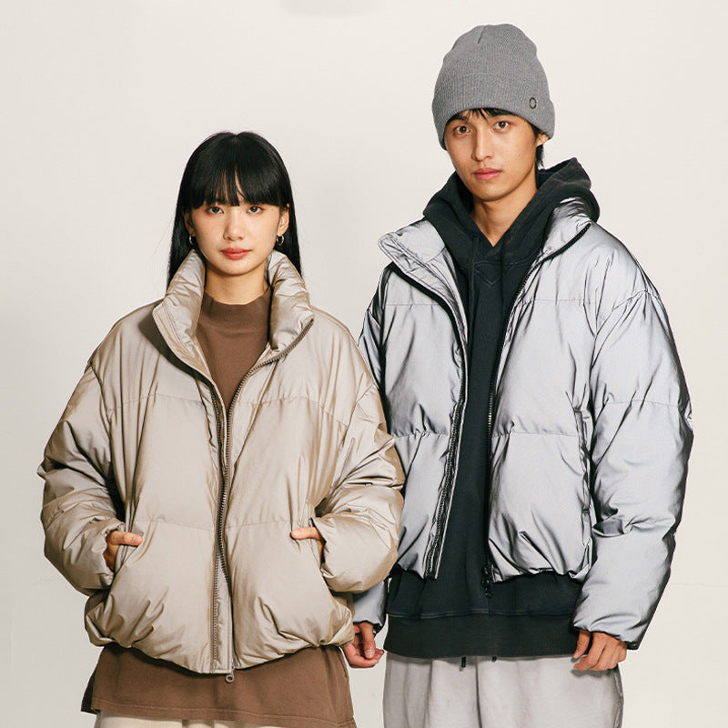 Woman wearing 3D Reflective Thickened Down Jacket in an urban setting