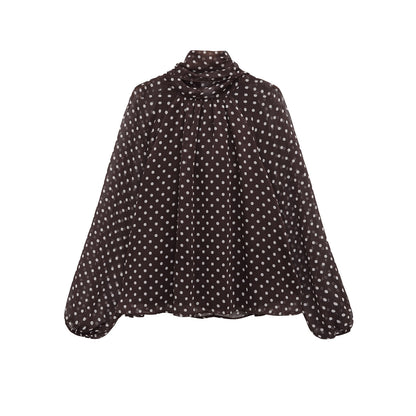 Woman wearing Bow Knot Polka Dot Long Sleeve Shirt in a casual setting