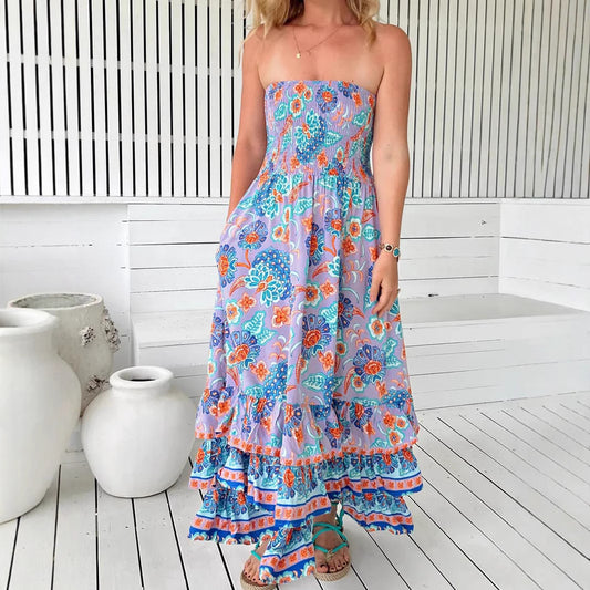 Woman wearing One-Shoulder Floral Ruffle Maxi Dress in a garden