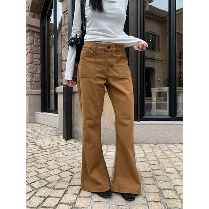 Woman wearing Distressed Flared Jeans with Pockets in a casual setting