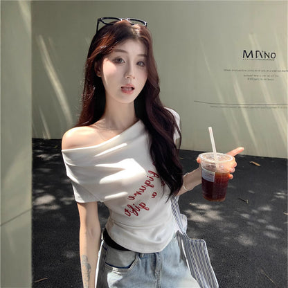 Woman wearing One Shoulder Fitted Crop Top in a casual setting