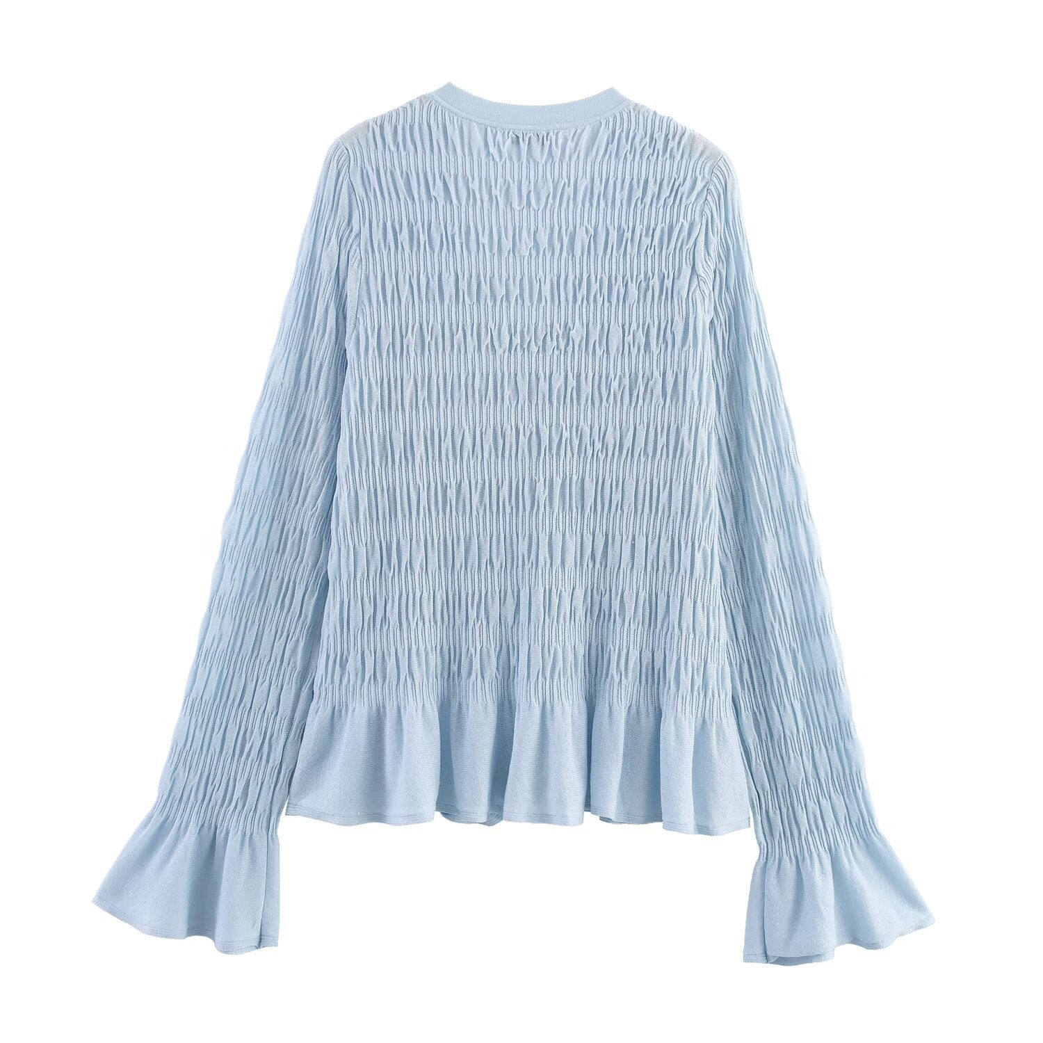 Woman wearing Light Blue Pleated Knitted Jacket in a casual setting