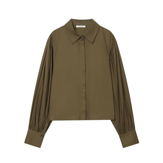 Woman wearing Bubble Sleeve Poplin Shirt in a casual setting