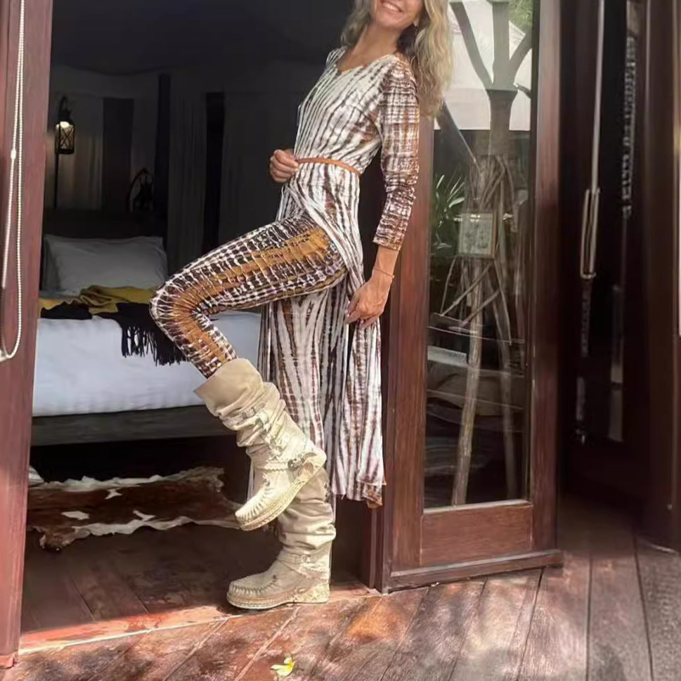 Woman wearing Burnout Print Slim Fit High-Waist Trousers in a chic urban setting