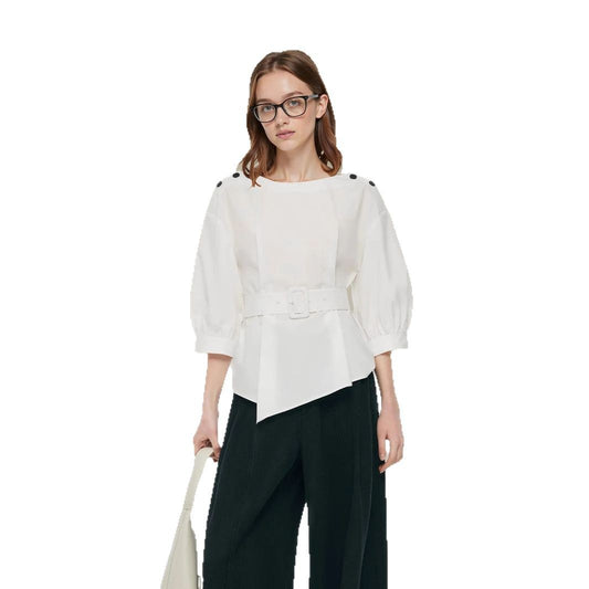 Woman wearing Irregular Round Neck Top in a stylish setting