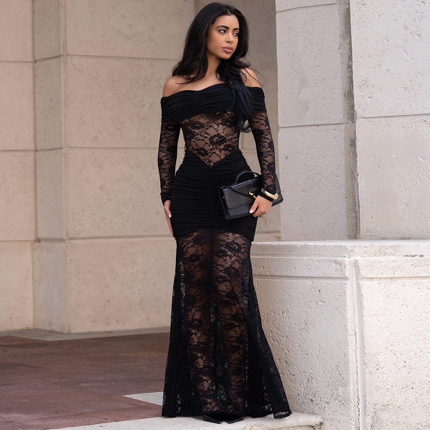 Woman wearing One-Shoulder Lace Bodycon Dress in an elegant setting