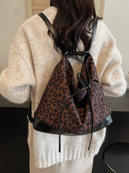 Women's Leopard Print PU Lace-Up Dual Purpose Crossbody Shoulder Bag – Model View | TajStylo